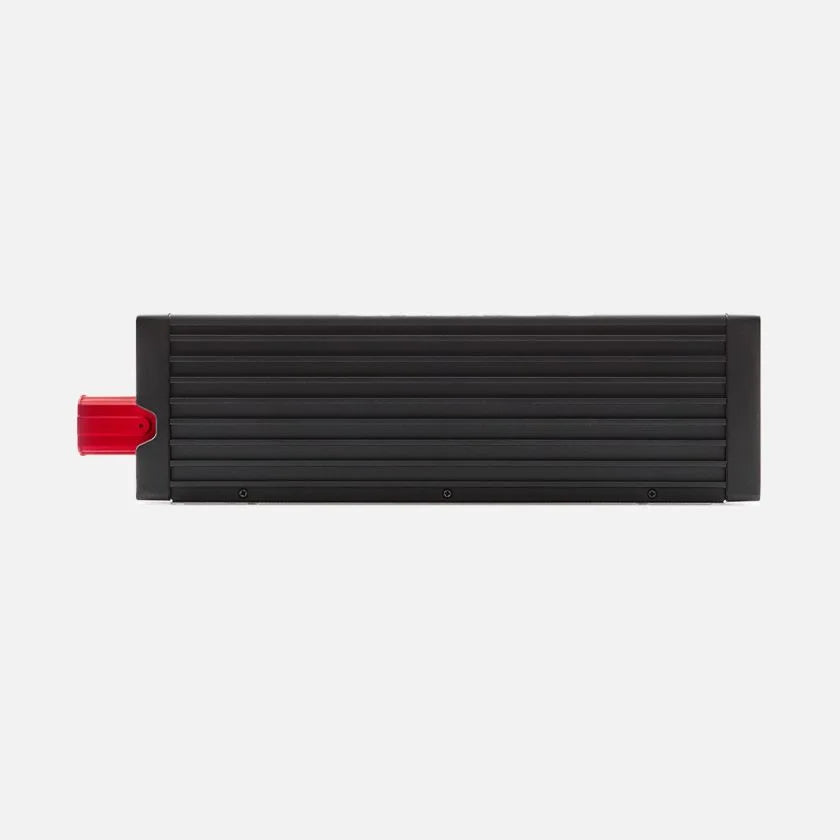 REDARC RS3 2000W inverter side profile showing heat sink fins and red positive DC terminal cover